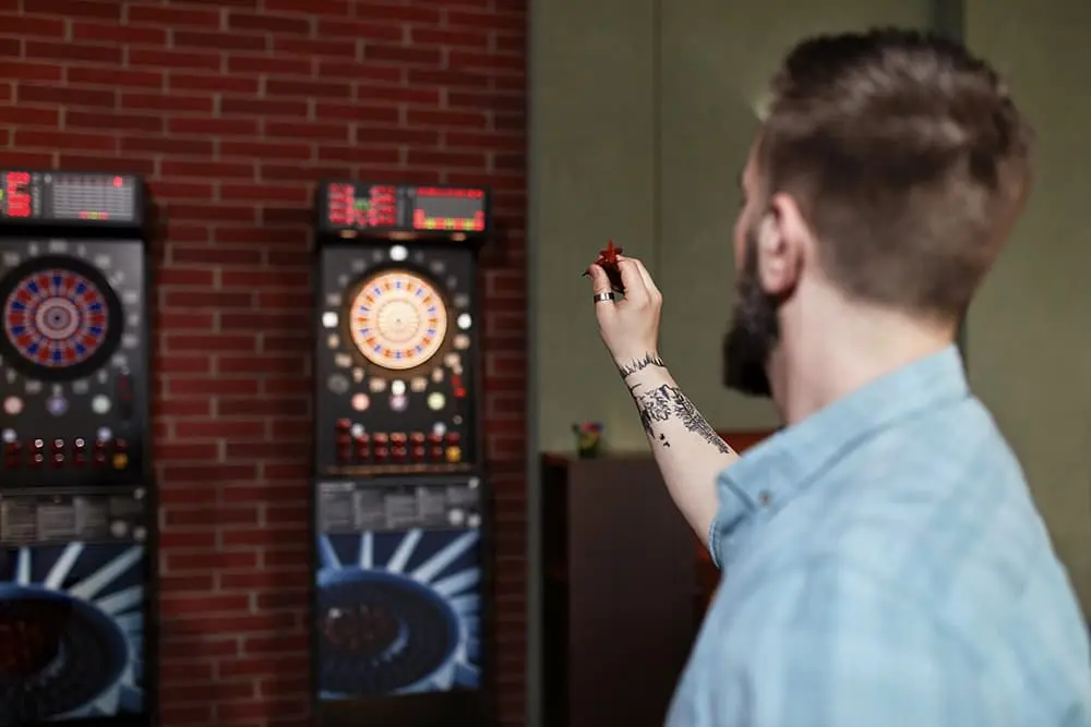 Man playing darts